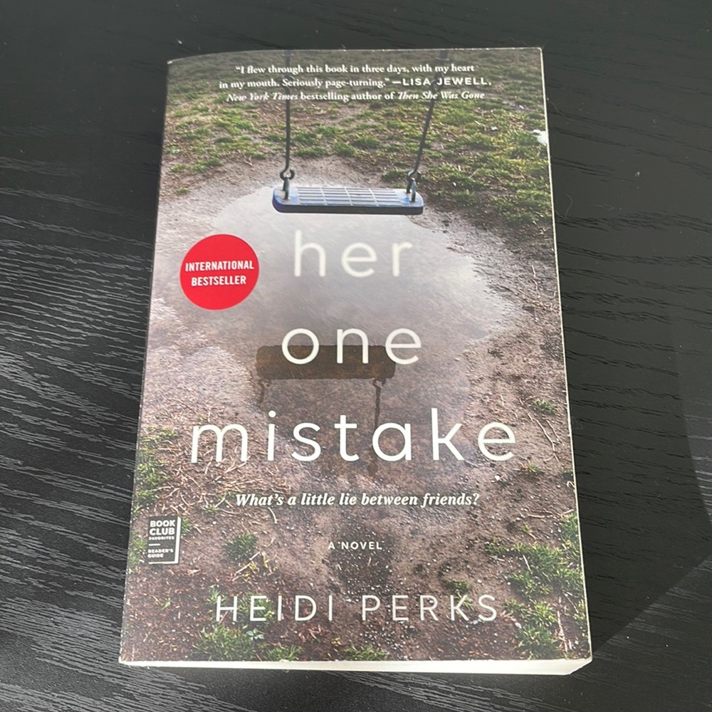 Paperback copy of “Her One Mistake” by Heidi Perks